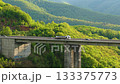 Freight Truck Crossing Mountain Viaduct 133375773