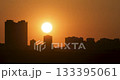 Sunset footage between the city and buildings.  133395061