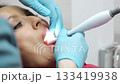 Dental oral examination with intraoral camera close up in clinic. 133419938