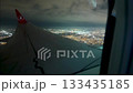 Istanbul,Turkey,August 1, 2025. Conceptual image of a night flight from the passenger's perspective, sitting next to the window. The Turkish airline's logo can be seen on the wing. A travel lifestyle. 133435185