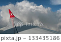 Turin, Italy, August 1,2025. Conceptual image of airplane travel from the perspective of a passenger sitting next to the window. The Turkish airline's logo can be seen on the wing. A travel lifestyle. 133435186
