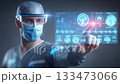 surgeon navigating a holographic patient chart with vital 133473066