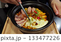 delicious korean fusion food melting cheese and spicy ramyeon in hot pot. 133477226