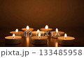 Seamless loop video of a candle flame gently flickering 133485958