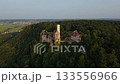 Aerial drone exploration of Lichtenstein Castle, perched above Honau in the Swabian Alps. Captured at dusk with epic scenery and German heritage vibes. Schloss Lichtenstein Wuerttemberg Luftbild 133556966