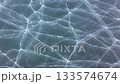 Texture background video of cracks and bubbles in the ice of a frozen lake [Generative AI] 133574674