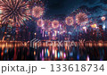 3d illustration of vibrantly colored new year's eve fireworks over a stylized cityscape 133618734