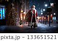 A man dressed as Santa Claus standing in front of a Christmas tree 133651521