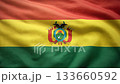 Bolivian flag waving from a top down aerial angle, tricolor red yellow green stripes, national pride and patriotic seamless video background, smooth fluttering cloth texture 133660592
