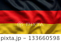 German flag waving from a top down aerial perspective, black red yellow tricolor stripes, patriotic seamless video background symbolizing national pride and unity 133660598