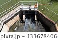 Drone Aerial View of Water Sluice Gate at Reservoir 133678406