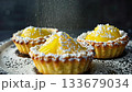 Tangy Calamansi Tart with Powdered Sugar in Buttery Pastry Crust Tangy Calamansi Tart with Powdered Sugar in Buttery Pastry Crust 133679034