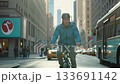 Urban commuters cycling through busy streets lined with high-rise buildings 133691142