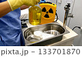 Lab tech handles radioactive material safely. Ai generated 133701870