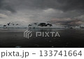 Stunning sunset over icy waters with floating icebergs in Antarctioca 133741664