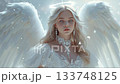 A stunning angel with long, flowing hair and large white wings stands majestically. She is adorned in a delicate, lace gown, radiating purity and grace in a serene atmosphere. 133748125