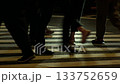 Japan: People crossing the street at night, close-up 133752659