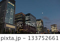 Tokyo, Japan: Night view of the densely packed high-rise buildings around Marunouchi, an office district (time-lapse photography) 133752661
