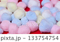 A close-up video of colorful cotton balls 133754754