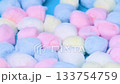 A close-up video of colorful cotton balls 133754759