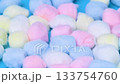 A close-up video of colorful cotton balls 133754760