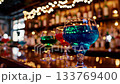 Vibrant cocktail celebration in a lively bar setting with bokeh lights 133769400