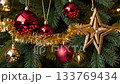 Festive christmas tree with sparkling ornaments, glittering lights, and golden stars 133769434