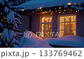 Cozy winter evening with festive holiday lights and snowcovered landscape 133769462