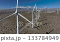Wind Turbines at San Gorgonio Pass near Palm Springs, California - Drone Pan Left 133784949