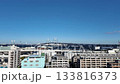 Harbor View Park, Yamatecho, Yokohama, Kanagawa, Japan, cityscape view of urban buildings with bridge and clear blue sky 133816373