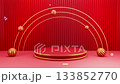 Vibrant red and gold 3D product display stage with dynamic striped spheres and modern geometric elements, ideal for festive promotion animation 133852770