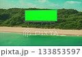 Green Screen Billboard on a Beach 133853597