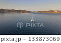 4K Aerial Video Of Catamaran Without Sail Drifting In Sea Bay  133873069