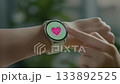 A scene of a smartwatch operating the heart rate icon 133892525