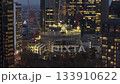 High angle view of a new skyscraper in financial district of Frankfurt am Main, Germany, surrounded by modern office towers at twilight 133910622