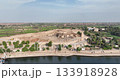 Aswan Egypt - September 2023: Aerial tour of Kom Ombo Temple showcases dual sanctuaries for Sobek and Haroeris, intricate hieroglyphs, and ancient sandstone columns under clear skies. 133918928