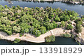 Aswan Egypt - September 17, 2023: Daytime drone views of the Nile capture Aswan islands and boats, showcasing the region natural beauty and rich Egyptian culture from a stunning aerial perspective 133918929