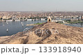 Aswan Egypt - September 17, 2023: Experience an aerial view of Qubbet elHawa in Aswan Egypt featuring the remarkable cliffside tombs of ancient nobles and priests from the Old and Middle Kingdoms 133918940