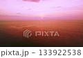 Aerial view Beautiful view sunset or sunrise over sea surface beautiful wave Amazing light twilight sky sunset 133922538