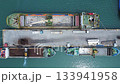 Loading a ship with containers at the port. Sea cargo transportation. Cargo 133941958