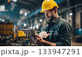 Industrial engineer wearing hardhat using digital tablet, managing and controlling machinery in factory, optimizing production processes and ensuring workplace safety 133947291