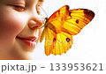 Smiling Child With Orange Butterfly On Nose Closeup. Concept Of Childhood Wonder, Nature Connection, Emotional Wellness, Mindfulness For Kids, Health, Wholesome Visuals For Positive Lifestyle Branding 133953621