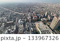 朝の光に包まれた大阪の広大なビル群の街並み　高所から俯瞰する近代的な都市風景のパノラマ 133967326