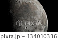 Close-Up of the Moon Surface With Craters and Shadowed Terminator Edge 134010336