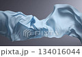 Blue Silk Fabric Wave: Abstract Flowing Material for Design and Fashion Backgrounds 134016044