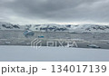 Stunning view over icy waters with floating icebergs in Antarctica 134017139
