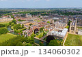 Aerial view of Cambridge University showing the River Cam, green spaces, and historic buildings 134060302