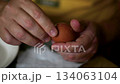 Boiled eggs for breakfast. Man remove eggshells, boiled egg. Eating proteins 134063104
