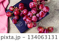 Pink grapes on brown neutral background, autumn harvest concept. 134063131