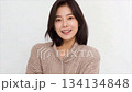 A beautiful Korean woman in her thirties, wearing a sweater_4 134134848